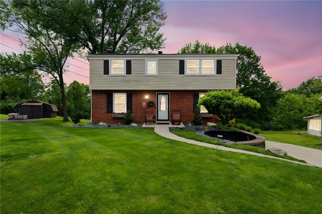 1369 Foxwood Dr, Monroeville, PA 15146 - colonial house with a front lawn and brick siding