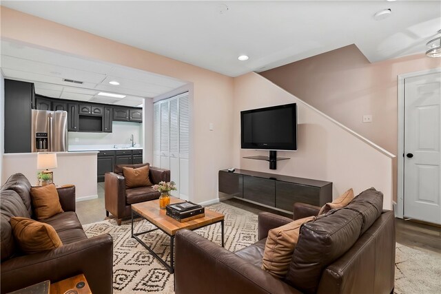 103 Cherokee Ct, Buffalo Twp But, PA 16229 - living room with bar with sink, recessed lighting, and baseboards