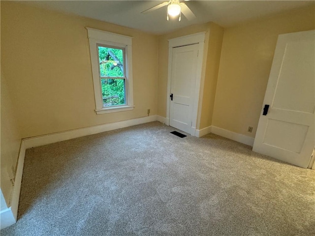 243 Oak St, City Of But Ne, PA 16001 - unfurnished bedroom with carpet flooring, baseboards, and a ceiling fan