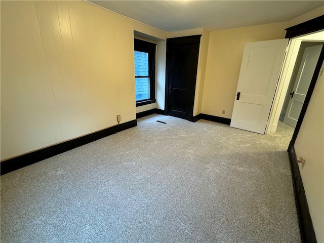 243 Oak St, City Of But Ne, PA 16001 - unfurnished bedroom with baseboards and carpet flooring