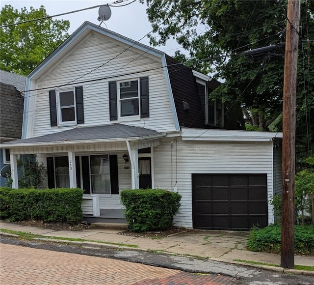 243 Oak St, City Of But Ne, PA 16001 - view of front of property with a gambrel roof, a porch, and decorative driveway