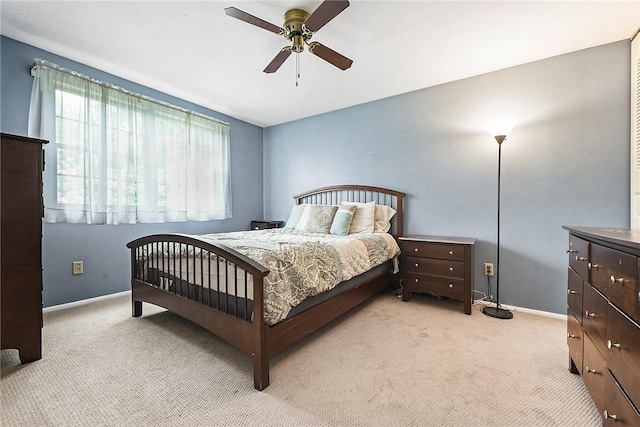 1050 Preston Dr N, Versailles, PA 15137 - carpeted bedroom with baseboards and a ceiling fan