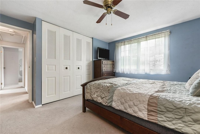 1050 Preston Dr N, Versailles, PA 15137 - bedroom with a closet, carpet flooring, a ceiling fan, attic access, and baseboards