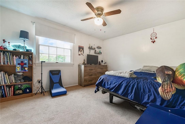 1050 Preston Dr N, Versailles, PA 15137 - carpeted bedroom featuring ceiling fan and a textured ceiling