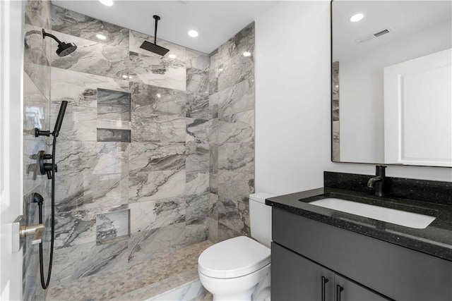 234 44th St, Lawrenceville, PA 15201 - full bath featuring vanity, toilet, a marble finish shower, and recessed lighting