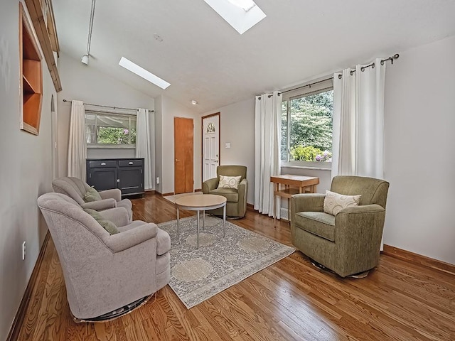 305 Ivy Dr, Pine Twp Nal, PA 15044 - living area with a skylight, lofted ceiling, and wood finished floors