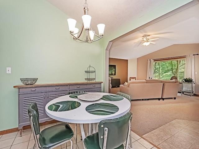 305 Ivy Dr, Pine Twp Nal, PA 15044 - dining area featuring vaulted ceiling, a chandelier, light tile patterned floors, ceiling fan, and arched walkways