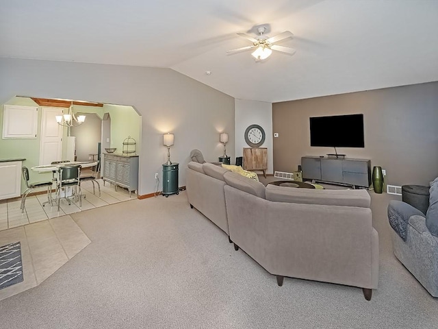 305 Ivy Dr, Pine Twp Nal, PA 15044 - living room featuring lofted ceiling, ceiling fan, a chandelier, and baseboards