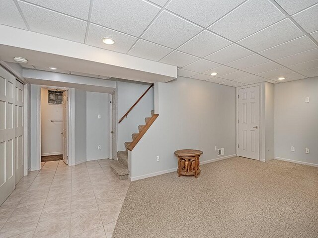 305 Ivy Dr, Pine Twp Nal, PA 15044 - finished below grade area with recessed lighting, stairs, baseboards, light tile patterned flooring, and a paneled ceiling