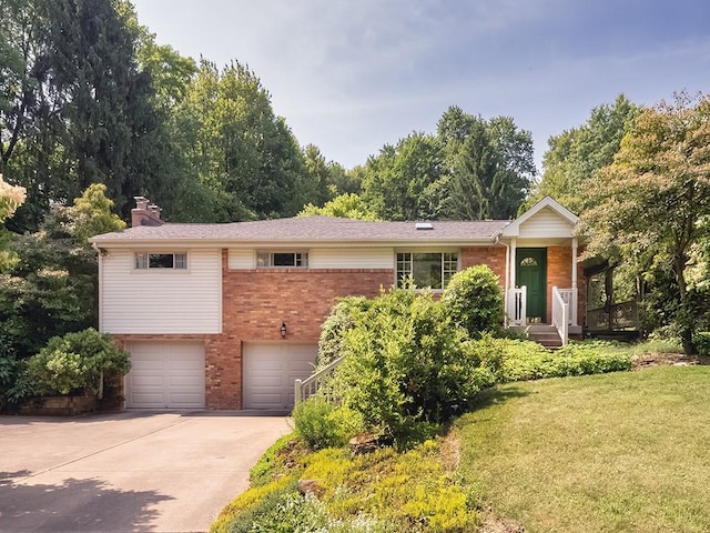 305 Ivy Dr, Pine Twp Nal, PA 15044 - view of front of house featuring brick siding, concrete driveway, a chimney, a garage, and a front yard