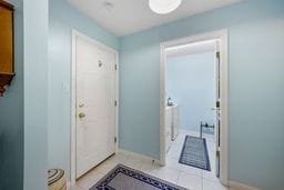 1011 Sunnyfield Ct, Penn Twp Wml, PA 15636 - doorway to outside with baseboards and light tile patterned flooring