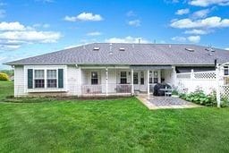 1011 Sunnyfield Ct, Penn Twp Wml, PA 15636 - rear view of property with a patio and a porch