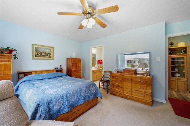 1011 Sunnyfield Ct, Penn Twp Wml, PA 15636 - bedroom featuring light colored carpet, ceiling fan, and ensuite bath