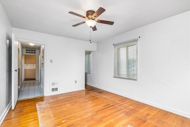27781/2 Mill St, Hopewell Twp Bea, PA 15001 - unfurnished bedroom featuring light wood-style floors, baseboards, and ceiling fan