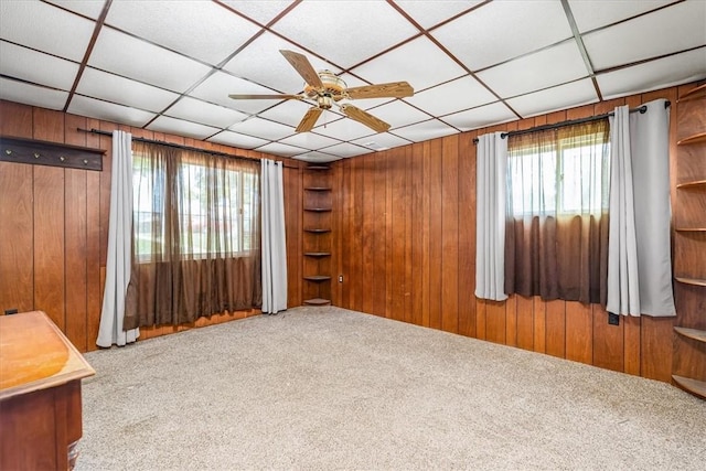 27781/2 Mill St, Hopewell Twp Bea, PA 15001 - carpeted spare room featuring wood walls, plenty of natural light, ceiling fan, and a paneled ceiling