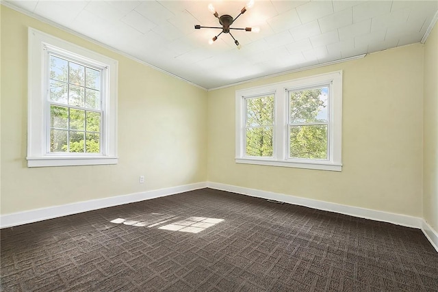 163 Universal Rd, Penn Hills, PA 15235 - spare room with dark carpet, healthy amount of natural light, ornamental molding, and baseboards