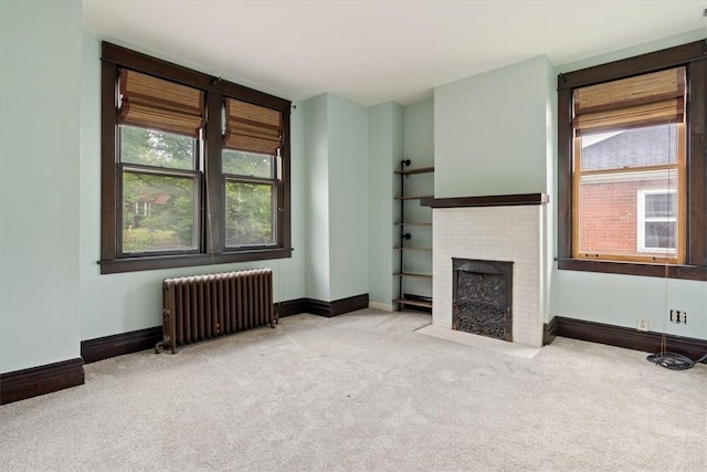 3319 Beechwood Blvd, Squirrel Hill, PA 15217 - unfurnished living room featuring radiator, carpet flooring, and baseboards
