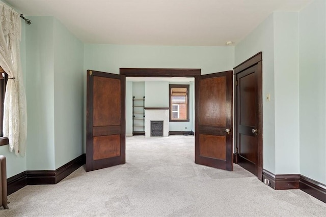 3319 Beechwood Blvd, Squirrel Hill, PA 15217 - unfurnished bedroom with carpet flooring, baseboards, and a fireplace