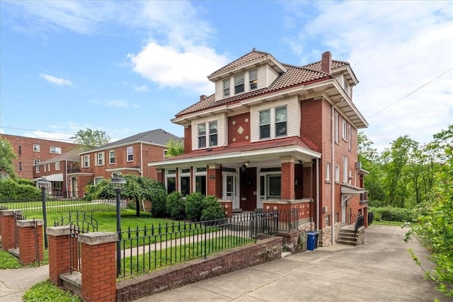 3319 Beechwood Blvd, Squirrel Hill, PA 15217 - traditional style home with covered porch, a chimney, brick siding, and a tile roof