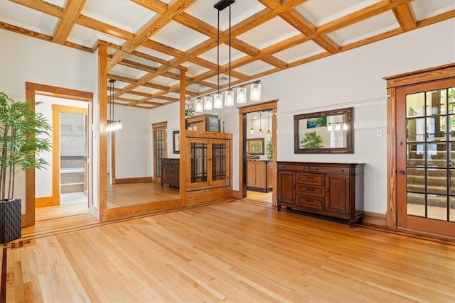 3319 Beechwood Blvd, Squirrel Hill, PA 15217 - unfurnished living room featuring coffered ceiling, light wood finished floors, beamed ceiling, and baseboards