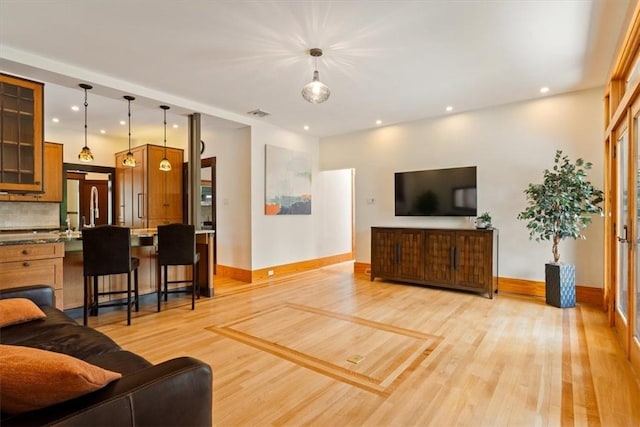 3319 Beechwood Blvd, Squirrel Hill, PA 15217 - living area featuring light wood finished floors, baseboards, and recessed lighting