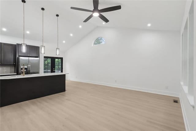 219 Randy Ln, Moon/Crescent Twp, PA 15108 - unfurnished living room with light wood-style floors, ceiling fan, high vaulted ceiling, recessed lighting, and baseboards