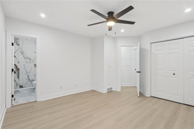 219 Randy Ln, Moon/Crescent Twp, PA 15108 - unfurnished bedroom with light wood finished floors, recessed lighting, baseboards, ensuite bathroom, and a ceiling fan