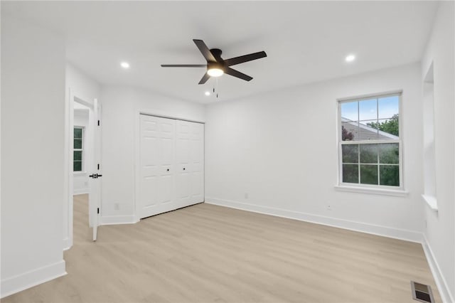 219 Randy Ln, Moon/Crescent Twp, PA 15108 - unfurnished bedroom featuring light wood finished floors, recessed lighting, baseboards, a closet, and a ceiling fan