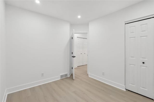 219 Randy Ln, Moon/Crescent Twp, PA 15108 - unfurnished bedroom with light wood-type flooring, recessed lighting, and baseboards