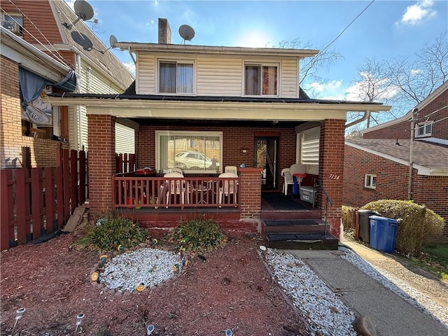 7134 Gladefield St, Lincoln-Larimer, PA 15206 - view of front of property with a porch and brick siding