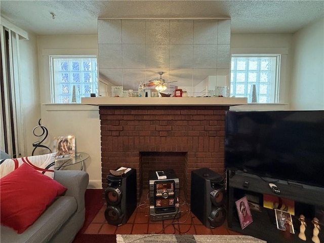 7134 Gladefield St, Lincoln-Larimer, PA 15206 - living room featuring a textured ceiling, a fireplace, healthy amount of natural light, and a ceiling fan