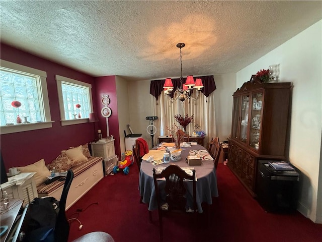 7134 Gladefield St, Lincoln-Larimer, PA 15206 - dining area with a chandelier, a textured ceiling, and carpet
