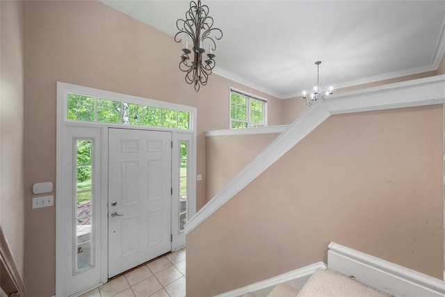 10276 Rinaman Rd, Mccandless, PA 15090 - entryway with a chandelier, light tile patterned flooring, ornamental molding, baseboards, and stairway