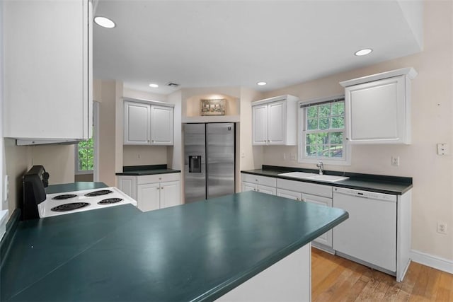 10276 Rinaman Rd, Mccandless, PA 15090 - kitchen featuring stainless steel fridge, dishwasher, a sink, electric range oven, and dark countertops