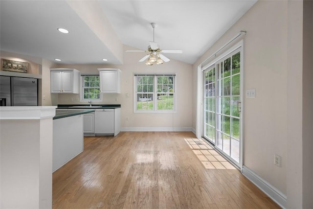 10276 Rinaman Rd, Mccandless, PA 15090 - kitchen featuring built in fridge, light wood finished floors, white cabinets, vaulted ceiling, and recessed lighting