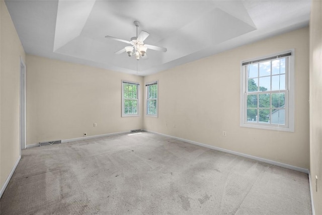 10276 Rinaman Rd, Mccandless, PA 15090 - carpeted spare room with a tray ceiling, baseboards, and ceiling fan