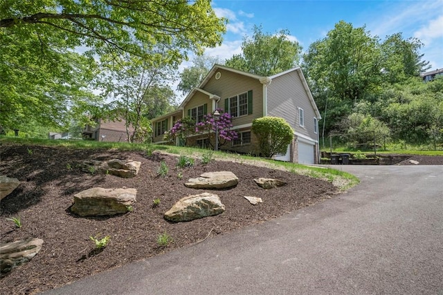 10276 Rinaman Rd, Mccandless, PA 15090 - ranch-style house featuring driveway and a garage