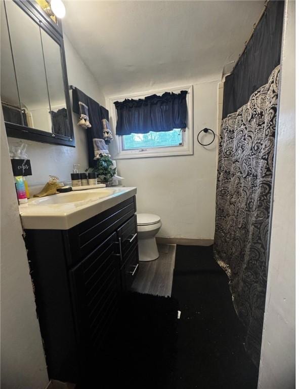 5 Barton Dr, Churchill Boro, PA 15221 - bathroom featuring toilet, vanity, a shower with curtain, and baseboards