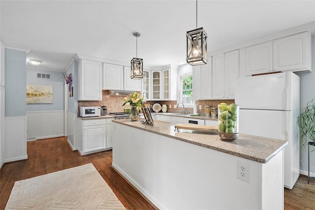 1544 Eldorado Dr, Hopewell Twp Bea, PA 15001 - kitchen with white appliances, dark wood-style flooring, a sink, white cabinetry, and a center island