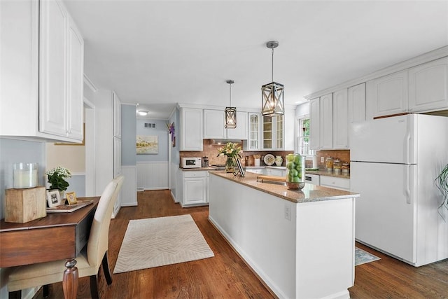 1544 Eldorado Dr, Hopewell Twp Bea, PA 15001 - kitchen featuring white appliances, white cabinetry, glass insert cabinets, dark wood finished floors, and tasteful backsplash