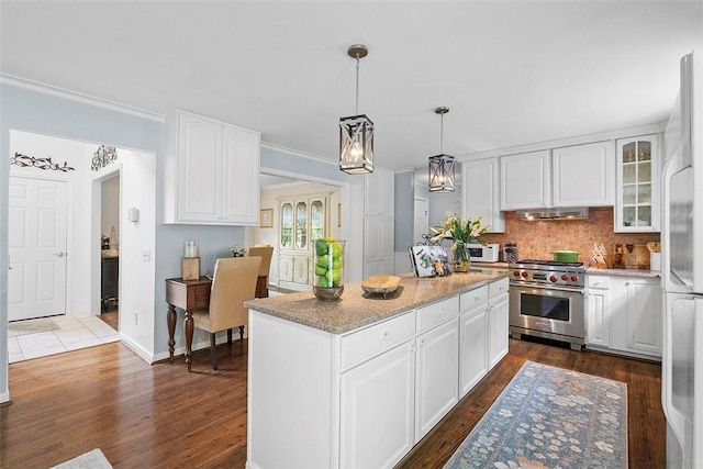1544 Eldorado Dr, Hopewell Twp Bea, PA 15001 - kitchen featuring white appliances, dark wood-style floors, white cabinetry, under cabinet range hood, and ornamental molding