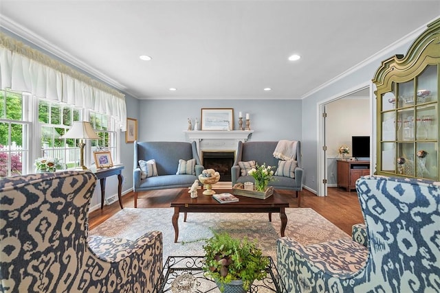 1544 Eldorado Dr, Hopewell Twp Bea, PA 15001 - living area featuring wood finished floors, baseboards, a fireplace, recessed lighting, and crown molding