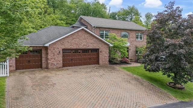 1544 Eldorado Dr, Hopewell Twp Bea, PA 15001 - view of front of property featuring an attached garage, brick siding, decorative driveway, and roof with shingles