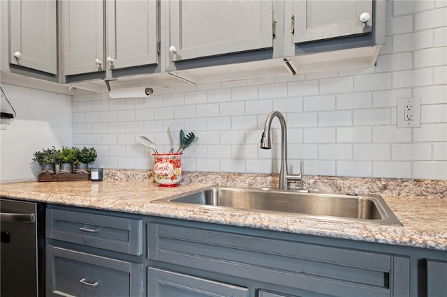 507 Sells Ln, Hempfield Twp Wml, PA 15601 - kitchen with a sink, light countertops, tasteful backsplash, and gray cabinetry