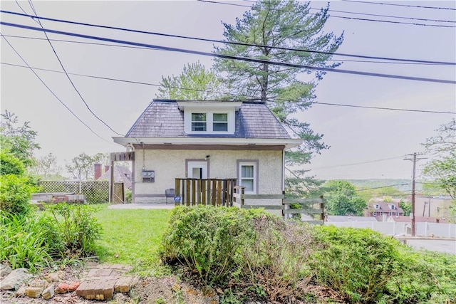136 E Crafton Ave, Crafton, PA 15205 - view of front facade featuring stucco siding and mansard roof
