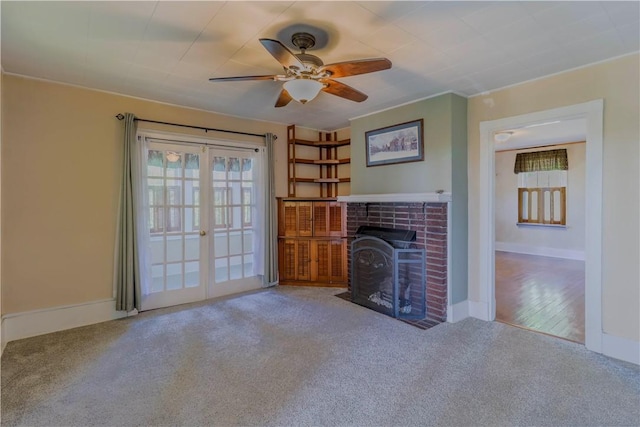 136 E Crafton Ave, Crafton, PA 15205 - unfurnished living room featuring healthy amount of natural light, carpet, a fireplace, and ceiling fan