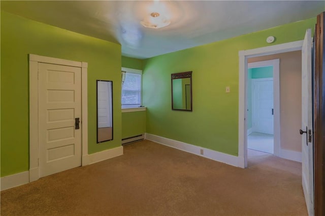 136 E Crafton Ave, Crafton, PA 15205 - empty room with baseboard heating, carpet, baseboards, and a smoke detector