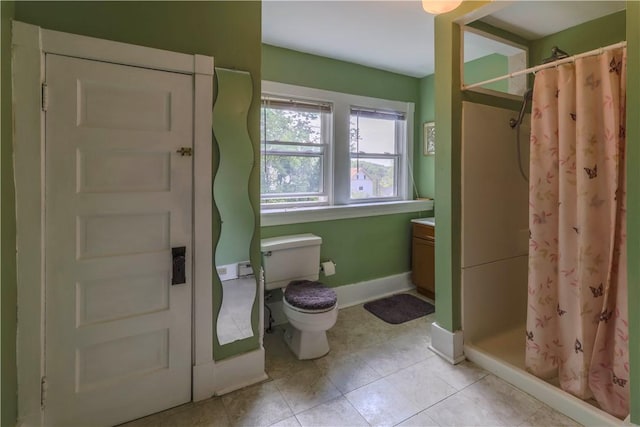 136 E Crafton Ave, Crafton, PA 15205 - bathroom featuring a shower stall, toilet, baseboards, and tile patterned flooring
