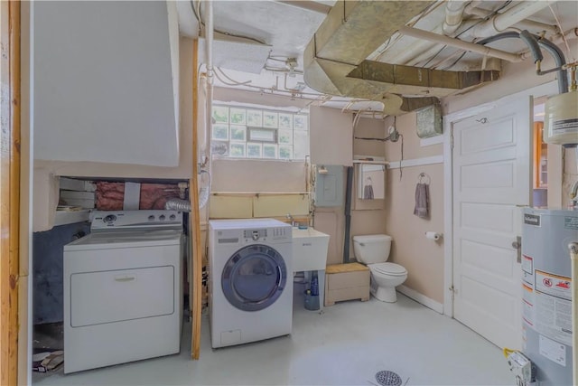 136 E Crafton Ave, Crafton, PA 15205 - washroom featuring gas water heater and independent washer and dryer