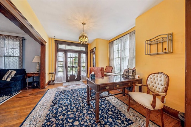 301 W Patriot St, Somerset Boro, PA 15501 - office with wood finished floors, baseboards, and a chandelier